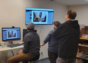 A Furnace World technician repairing an AC in Monument